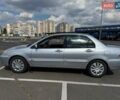 Сірий Міцубісі Lancer, об'ємом двигуна 1.59 л та пробігом 288 тис. км за 4500 $, фото 2 на Automoto.ua