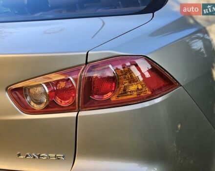 Серый Мицубиси Лансер, объемом двигателя 2 л и пробегом 282 тыс. км за 5450 $, фото 42 на Automoto.ua