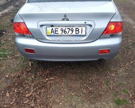 Серый Мицубиси Лансер, объемом двигателя 1.6 л и пробегом 220 тыс. км за 4000 $, фото 1 на Automoto.ua