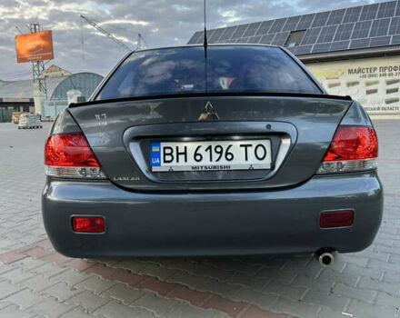 Сірий Міцубісі Lancer, об'ємом двигуна 1.6 л та пробігом 189 тис. км за 6200 $, фото 4 на Automoto.ua