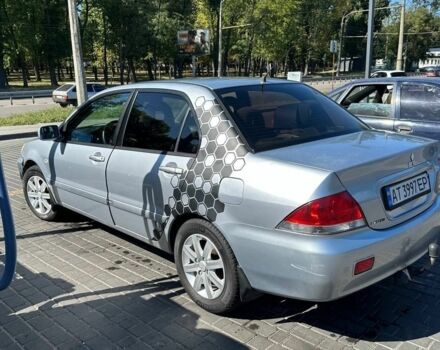 Сірий Міцубісі Lancer, об'ємом двигуна 1.6 л та пробігом 460 тис. км за 3200 $, фото 3 на Automoto.ua