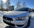 Серый Мицубиси Лансер, объемом двигателя 1.5 л и пробегом 237 тыс. км за 4999 $, фото 1 на Automoto.ua