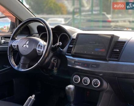 Серый Мицубиси Лансер, объемом двигателя 2 л и пробегом 150 тыс. км за 6100 $, фото 17 на Automoto.ua