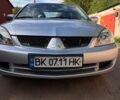 Сірий Міцубісі Lancer, об'ємом двигуна 1.58 л та пробігом 276 тис. км за 4100 $, фото 1 на Automoto.ua