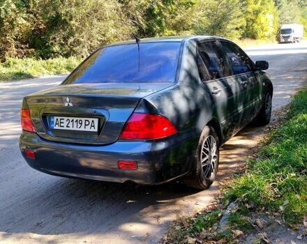 Сірий Міцубісі Lancer, об'ємом двигуна 1.6 л та пробігом 300 тис. км за 4300 $, фото 3 на Automoto.ua