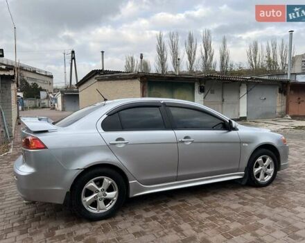 Серый Мицубиси Лансер, объемом двигателя 2 л и пробегом 180 тыс. км за 6799 $, фото 4 на Automoto.ua
