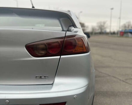 Серый Мицубиси Лансер, объемом двигателя 2 л и пробегом 286 тыс. км за 5800 $, фото 16 на Automoto.ua