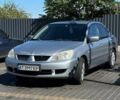 Сірий Міцубісі Lancer, об'ємом двигуна 1.6 л та пробігом 460 тис. км за 3350 $, фото 1 на Automoto.ua