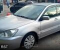 Серый Мицубиси Лансер, объемом двигателя 1.6 л и пробегом 230 тыс. км за 4500 $, фото 3 на Automoto.ua