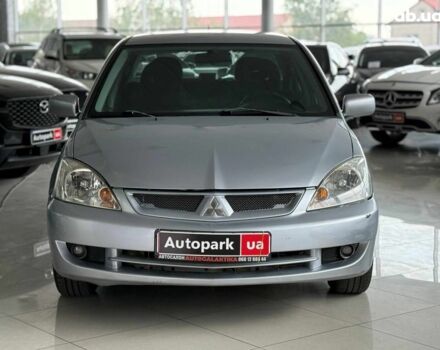 Серый Мицубиси Лансер, объемом двигателя 1.6 л и пробегом 174 тыс. км за 5990 $, фото 1 на Automoto.ua