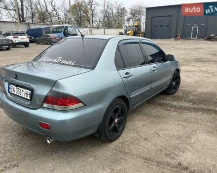 Сірий Міцубісі Lancer, об'ємом двигуна 1.58 л та пробігом 341 тис. км за 4500 $, фото 3 на Automoto.ua