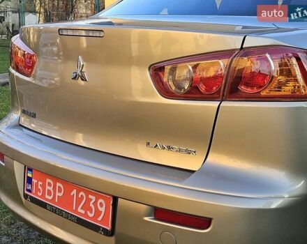 Серый Мицубиси Лансер, объемом двигателя 2 л и пробегом 282 тыс. км за 5450 $, фото 36 на Automoto.ua