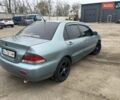 Сірий Міцубісі Lancer, об'ємом двигуна 1.58 л та пробігом 341 тис. км за 4500 $, фото 3 на Automoto.ua
