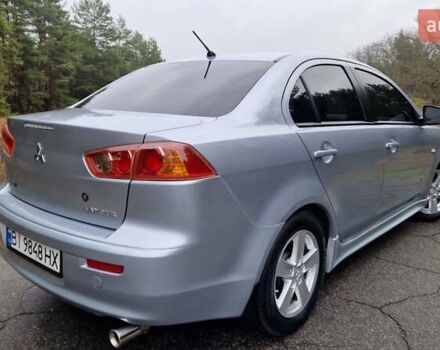 Серый Мицубиси Лансер, объемом двигателя 2 л и пробегом 213 тыс. км за 6550 $, фото 2 на Automoto.ua