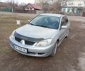 Сірий Міцубісі Lancer, об'ємом двигуна 1.6 л та пробігом 197 тис. км за 5100 $, фото 1 на Automoto.ua