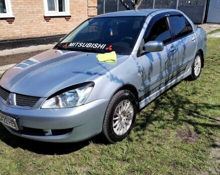 Сірий Міцубісі Lancer, об'ємом двигуна 1.6 л та пробігом 290 тис. км за 4600 $, фото 10 на Automoto.ua