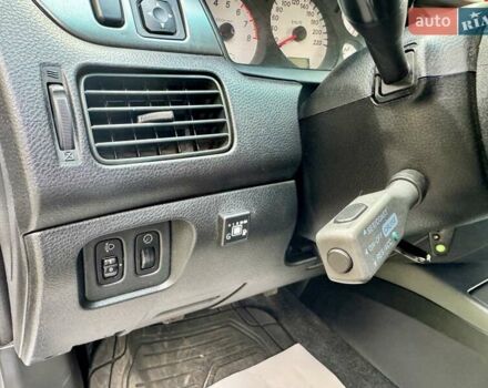 Сірий Міцубісі Lancer, об'ємом двигуна 1.58 л та пробігом 138 тис. км за 4990 $, фото 26 на Automoto.ua