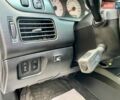 Сірий Міцубісі Lancer, об'ємом двигуна 1.58 л та пробігом 138 тис. км за 4990 $, фото 26 на Automoto.ua
