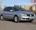 Серый Мицубиси Лансер, объемом двигателя 1.6 л и пробегом 280 тыс. км за 5300 $, фото 1 на Automoto.ua