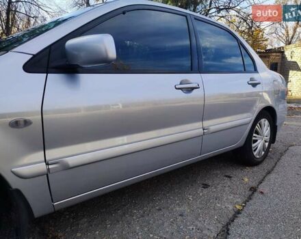 Сірий Міцубісі Lancer, об'ємом двигуна 1.58 л та пробігом 122 тис. км за 6300 $, фото 28 на Automoto.ua