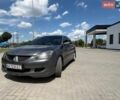 Сірий Міцубісі Lancer, об'ємом двигуна 2 л та пробігом 297 тис. км за 4300 $, фото 1 на Automoto.ua