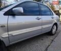 Сірий Міцубісі Lancer, об'ємом двигуна 1.58 л та пробігом 122 тис. км за 6300 $, фото 28 на Automoto.ua