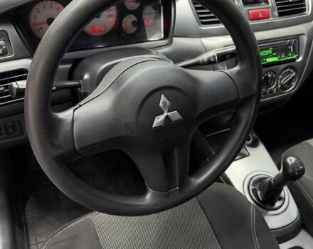 Серый Мицубиси Лансер, объемом двигателя 1.58 л и пробегом 271 тыс. км за 4200 $, фото 19 на Automoto.ua