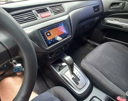 Сірий Міцубісі Lancer, об'ємом двигуна 1.58 л та пробігом 416 тис. км за 3100 $, фото 2 на Automoto.ua