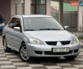 Сірий Міцубісі Lancer, об'ємом двигуна 1.6 л та пробігом 281 тис. км за 3999 $, фото 1 на Automoto.ua