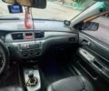 Серый Мицубиси Лансер, объемом двигателя 1.6 л и пробегом 298 тыс. км за 4100 $, фото 78 на Automoto.ua