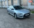 Серый Мицубиси Лансер, объемом двигателя 2 л и пробегом 212 тыс. км за 6300 $, фото 1 на Automoto.ua