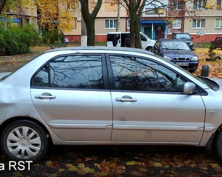 Серый Мицубиси Лансер, объемом двигателя 1.6 л и пробегом 430 тыс. км за 2500 $, фото 2 на Automoto.ua