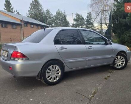 Сірий Міцубісі Lancer, об'ємом двигуна 1.6 л та пробігом 213 тис. км за 3600 $, фото 11 на Automoto.ua