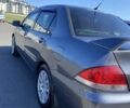 Сірий Міцубісі Lancer, об'ємом двигуна 1.6 л та пробігом 293 тис. км за 5000 $, фото 2 на Automoto.ua