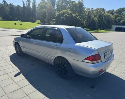 Серый Мицубиси Лансер, объемом двигателя 1.6 л и пробегом 265 тыс. км за 4100 $, фото 5 на Automoto.ua