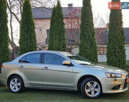 Серый Мицубиси Лансер, объемом двигателя 2 л и пробегом 282 тыс. км за 5450 $, фото 4 на Automoto.ua