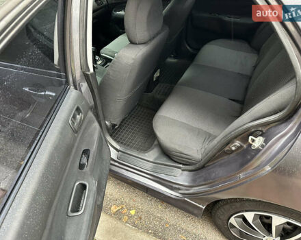 Серый Мицубиси Лансер, объемом двигателя 1.6 л и пробегом 115 тыс. км за 2800 $, фото 13 на Automoto.ua