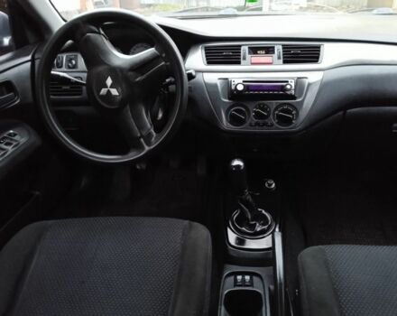 Сірий Міцубісі Lancer, об'ємом двигуна 1 л та пробігом 400 тис. км за 2850 $, фото 7 на Automoto.ua