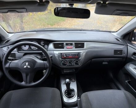Сірий Міцубісі Lancer, об'ємом двигуна 1.6 л та пробігом 247 тис. км за 4900 $, фото 5 на Automoto.ua