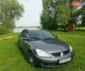 Сірий Міцубісі Lancer, об'ємом двигуна 1.58 л та пробігом 220 тис. км за 4500 $, фото 3 на Automoto.ua