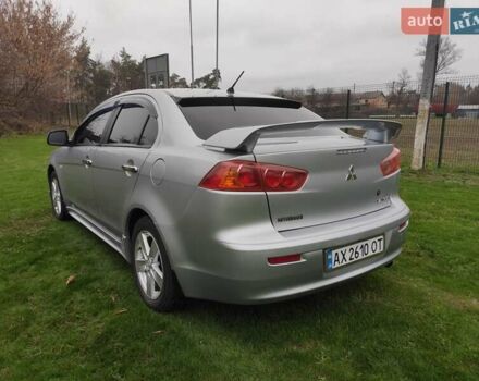 Сірий Міцубісі Lancer, об'ємом двигуна 2 л та пробігом 124 тис. км за 7499 $, фото 6 на Automoto.ua