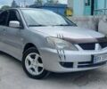 Серый Мицубиси Лансер, объемом двигателя 1.6 л и пробегом 298 тыс. км за 4100 $, фото 1 на Automoto.ua
