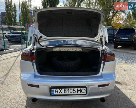 Серый Мицубиси Лансер, объемом двигателя 2 л и пробегом 150 тыс. км за 6100 $, фото 13 на Automoto.ua