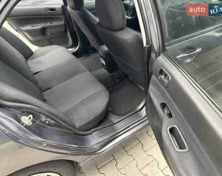 Сірий Міцубісі Lancer, об'ємом двигуна 1.6 л та пробігом 115 тис. км за 2800 $, фото 17 на Automoto.ua