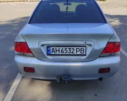 Серый Мицубиси Лансер, объемом двигателя 1.6 л и пробегом 187 тыс. км за 4500 $, фото 1 на Automoto.ua