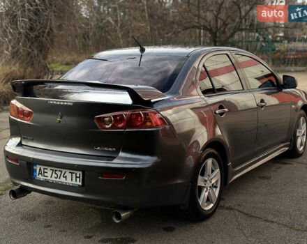 Сірий Міцубісі Lancer, об'ємом двигуна 2 л та пробігом 220 тис. км за 6800 $, фото 2 на Automoto.ua