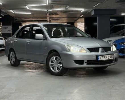 Серый Мицубиси Лансер, объемом двигателя 1.58 л и пробегом 271 тыс. км за 4200 $, фото 3 на Automoto.ua