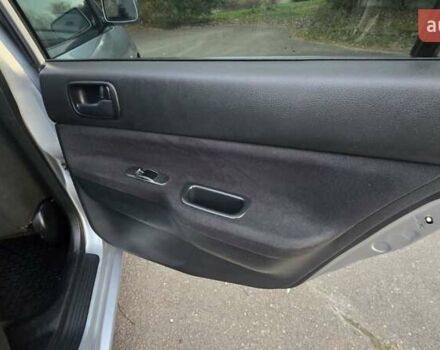 Сірий Міцубісі Lancer, об'ємом двигуна 1.6 л та пробігом 213 тис. км за 3600 $, фото 29 на Automoto.ua