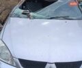 Серый Мицубиси Лансер, объемом двигателя 1.58 л и пробегом 159 тыс. км за 1800 $, фото 1 на Automoto.ua