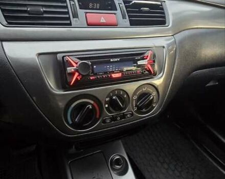 Сірий Міцубісі Lancer, об'ємом двигуна 1.6 л та пробігом 213 тис. км за 3600 $, фото 14 на Automoto.ua